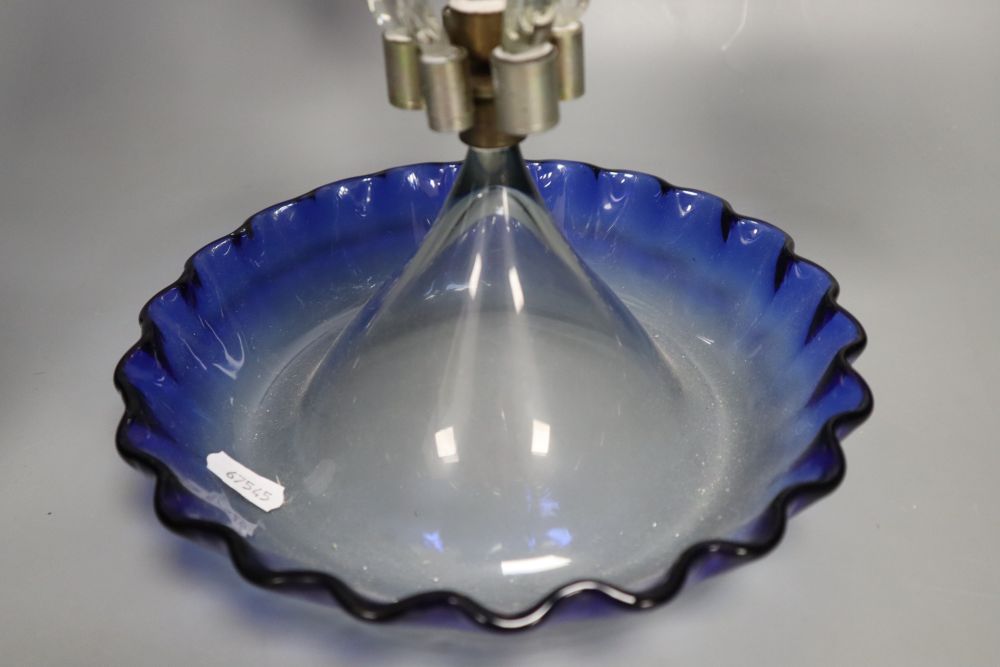 A Victorian blue and clear glass epergne, with trailed glass ornament, 49cm